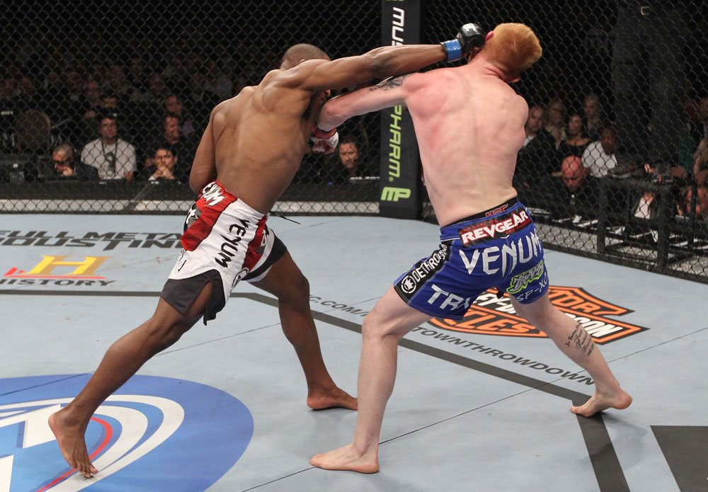 LAS VEGAS, NV - FEBRUARY 04:  Clifford Starks (left) punches Ed Herman during the UFC 143 event at Mandalay Bay Events Center on February 4, 2012 in Las Vegas, Nevada.  (Photo by Nick Laham/Zuffa LLC/Zuffa LLC via Getty Images) *** Local Caption *** Clifford Starks; Ed Herman