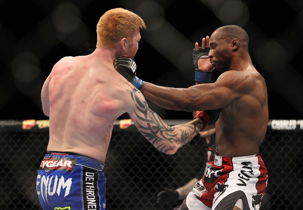 LAS VEGAS, NV - FEBRUARY 04:  Ed Herman (left) punches Clifford Starks during the UFC 143 event at Mandalay Bay Events Center on February 4, 2012 in Las Vegas, Nevada.  (Photo by Josh Hedges/Zuffa LLC/Zuffa LLC via Getty Images) *** Local Caption *** Ed Herman; Clifford Starks
