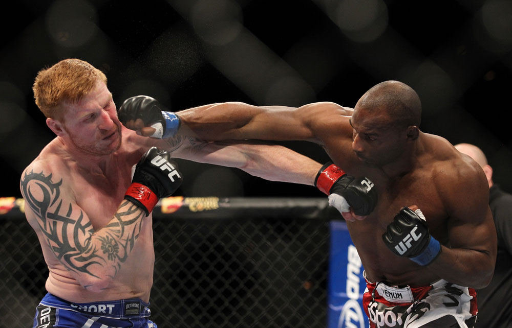 LAS VEGAS, NV - FEBRUARY 04:  (L-R) Ed Herman and Clifford Starks exchange punches during the UFC 143 event at Mandalay Bay Events Center on February 4, 2012 in Las Vegas, Nevada.  (Photo by Josh Hedges/Zuffa LLC/Zuffa LLC via Getty Images) *** Local Caption *** Ed Herman; Clifford Starks