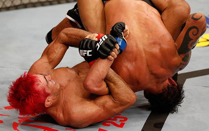SAO PAULO, BRAZIL - JANUARY 19: (L-R) Godofredo "Pepey" Castro attempts a shoulder lock submission against Milton Vieira in their featherweight fight at the UFC on FX event on January 19, 2013 at Ibirapuera Gymnasium in Sao Paulo, Brazil. (Photo by Josh Hedges/Zuffa LLC/Zuffa LLC via Getty Images)