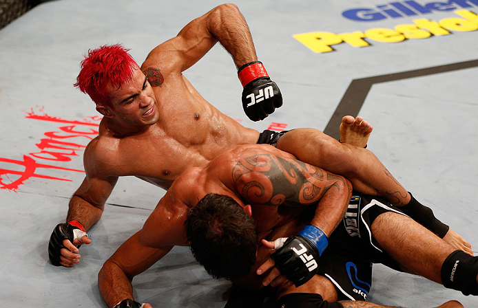 SAO PAULO, BRAZIL - JANUARY 19: (L-R) Godofredo "Pepey" Castro punches Milton Vieira in their featherweight fight at the UFC on FX event on January 19, 2013 at Ibirapuera Gymnasium in Sao Paulo, Brazil. (Photo by Josh Hedges/Zuffa LLC/Zuffa LLC via Getty Images)