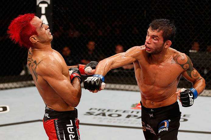 SAO PAULO, BRAZIL - JANUARY 19: (R-L) Milton Vieira punches Godofredo "Pepey" Castro in their featherweight fight at the UFC on FX event on January 19, 2013 at Ibirapuera Gymnasium in Sao Paulo, Brazil. (Photo by Josh Hedges/Zuffa LLC/Zuffa LLC via Getty Images)