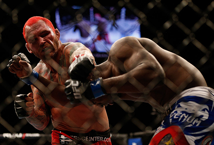 LAS VEGAS, NV - DECEMBER 29:  (L-R) Chris Leben punches Derek Brunson during their middleweight fight at UFC 155 on December 29, 2012 at MGM Grand Garden Arena in Las Vegas, Nevada. (Photo by Josh Hedges/Zuffa LLC/Zuffa LLC via Getty Images) *** Local Caption *** Chris Leben; Derek Brunson