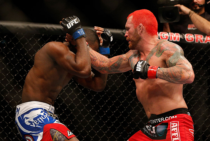 LAS VEGAS, NV - DECEMBER 29:  Chris Leben punches Derek Brunson during their middleweight fight at UFC 155 on December 29, 2012 at MGM Grand Garden Arena in Las Vegas, Nevada. (Photo by Josh Hedges/Zuffa LLC/Zuffa LLC via Getty Images) *** Local Caption *** Chris Leben; Derek Brunson