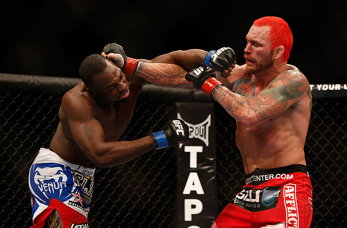 LAS VEGAS, NV - DECEMBER 29:  (R-L) Chris Leben punches Derek Brunson during their middleweight fight at UFC 155 on December 29, 2012 at MGM Grand Garden Arena in Las Vegas, Nevada. (Photo by Josh Hedges/Zuffa LLC/Zuffa LLC via Getty Images) *** Local Caption *** Chris Leben; Derek Brunson