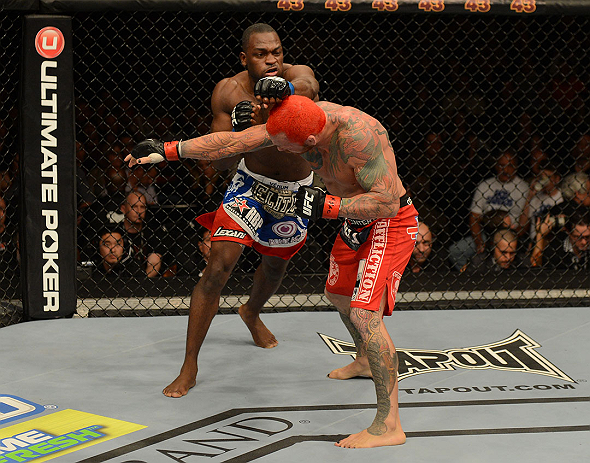 LAS VEGAS, NV - DECEMBER 29:  Derek Brunson (left) punches Chris Leben during their middleweight fight at UFC 155 on December 29, 2012 at MGM Grand Garden Arena in Las Vegas, Nevada. (Photo by Donald Miralle/Zuffa LLC/Zuffa LLC via Getty Images) *** Local Caption *** Chris Leben; Derek Brunson