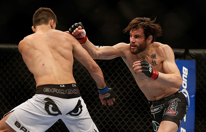LAS VEGAS, NV - FEBRUARY 02:  (R-L) Jon Fitch punches Demian Maia during their welterweight fight at UFC 156 on February 2, 2013 at the Mandalay Bay Events Center in Las Vegas, Nevada.  (Photo by Josh Hedges/Zuffa LLC/Zuffa LLC via Getty Images) *** Local Caption *** Jon Fitch; Demian Maia