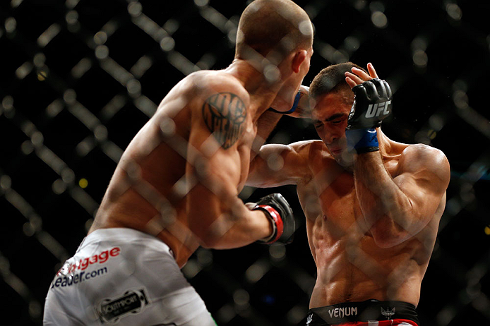 CHICAGO, IL - JANUARY 26:  Ricardo Lamas (R) fights Erik Koch (L) during their Featherweight Bout part of UFC on FOX at United Center on January 26, 2013 in Chicago, Illinois.  (Photo by Josh Hedges/Zuffa LLC/Zuffa LLC Via Getty Images)