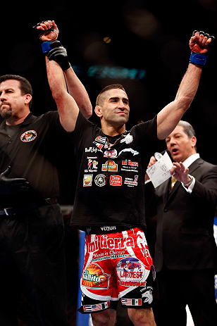 CHICAGO, IL - JANUARY 26:  Ricardo Lamas celebrates after defeating Erik Koch during their Featherweight Bout part of UFC on FOX at United Center on January 26, 2013 in Chicago, Illinois.  (Photo by Josh Hedges/Zuffa LLC/Zuffa LLC Via Getty Images)