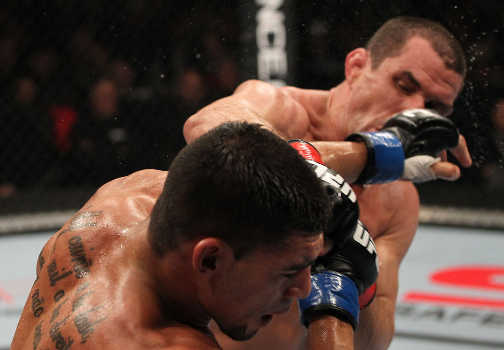 OMAHA, NE - FEBRUARY 15:  (R-L) Aaron Simpson punches Ronny Markes during the UFC on FUEL TV event at Omaha Civic Auditorium on February 15, 2012 in Omaha, Nebraska.  (Photo by Josh Hedges/Zuffa LLC/Zuffa LLC via Getty Images) *** Local Caption *** Aaron Simpson; Ronny Markes