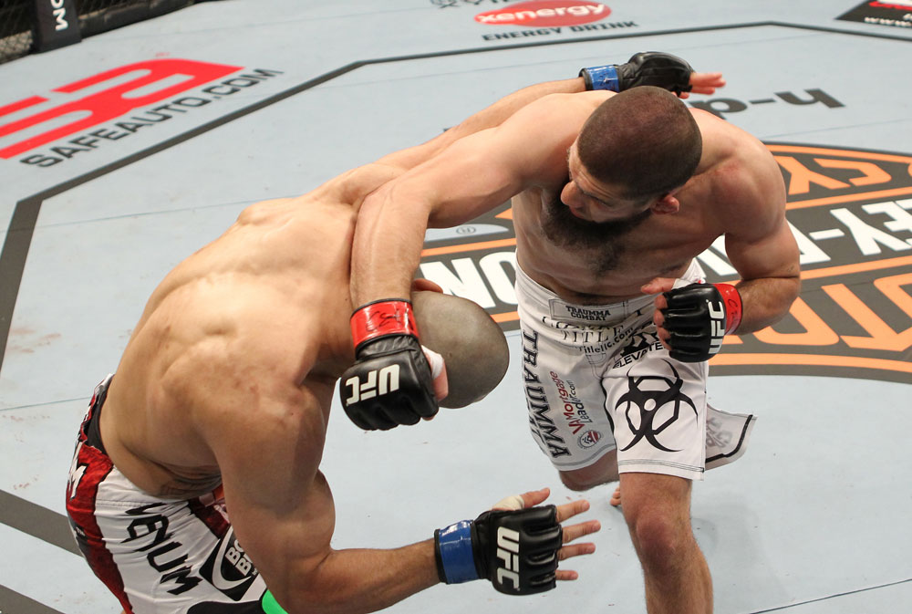 SYDNEY, AUSTRALIA - MARCH 03: (R-L) Court McGee punches Constantinos Philippou in a middleweight bout during the UFC on FX event at Allphones Arena on March 3, 2012 in Sydney, Australia. (Photo by Josh Hedges/Zuffa LLC/Zuffa LLC via Getty Images) *** Local Caption *** Court McGee; Constantinos Philippou