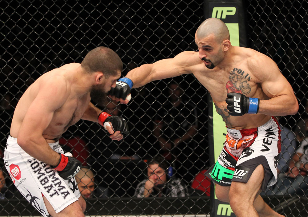 SYDNEY, AUSTRALIA - MARCH 03: (R-L) Constantinos Philippou punches Court McGee in a middleweight bout during the UFC on FX event at Allphones Arena on March 3, 2012 in Sydney, Australia. (Photo by Josh Hedges/Zuffa LLC/Zuffa LLC via Getty Images) *** Local Caption *** Court McGee; Constantinos Philippou