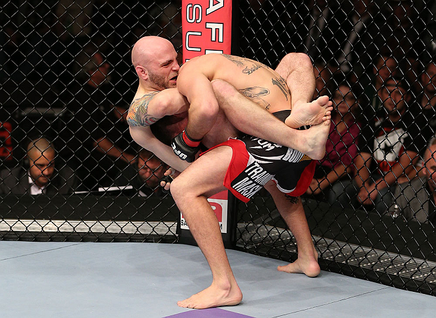 MINNEAPOLIS, MN - OCTOBER 05: (L-R) Justin Edwards secures a guillotine choke submission to defeat Josh Neer during their welterweight fight at the UFC on FX event at Target Center on October 5, 2012 in Minneapolis, Minnesota. (Photo by Josh Hedges/Zuffa LLC/Zuffa LLC via Getty Images)