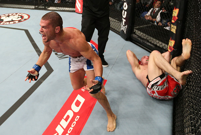 NOTTINGHAM, ENGLAND - SEPTEMBER 29: Matt Wiman (L) reacts after defeating Paul Sass during their lightweight fight at the UFC on Fuel TV event at Capital FM Arena on September 29, 2012 in Nottingham, England. (Photo by Josh Hedges/Zuffa LLC/Zuffa LLC via Getty Images)