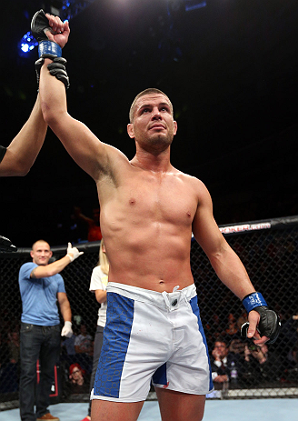 NOTTINGHAM, ENGLAND - SEPTEMBER 29: Matt Wiman reacts after defeating Paul Sass during their lightweight fight at the UFC on Fuel TV event at Capital FM Arena on September 29, 2012 in Nottingham, England. (Photo by Josh Hedges/Zuffa LLC/Zuffa LLC via Getty Images)