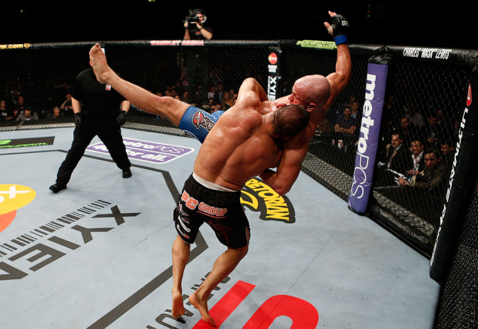 LONDON, ENGLAND - FEBRUARY 16: (L-R) James Te Huna takes down Ryan Jimmo in their light heavyweight fight during the UFC on Fuel TV event on February 16, 2013 at Wembley Arena in London, England. (Photo by Josh Hedges/Zuffa LLC/Zuffa LLC via Getty Images)