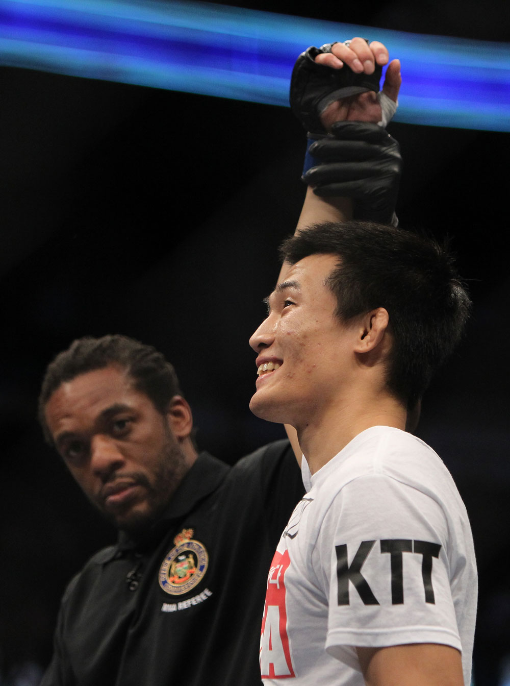 TORONTO, ON - DECEMBER 10:  "The Korean Zombie" Chan Sung Jung reacts after knocking out Mark Hominick during the UFC 140 event at Air Canada Centre on December 10, 2011 in Toronto, Ontario, Canada.  (Photo by Josh Hedges/Zuffa LLC/Zuffa LLC via Getty Images)