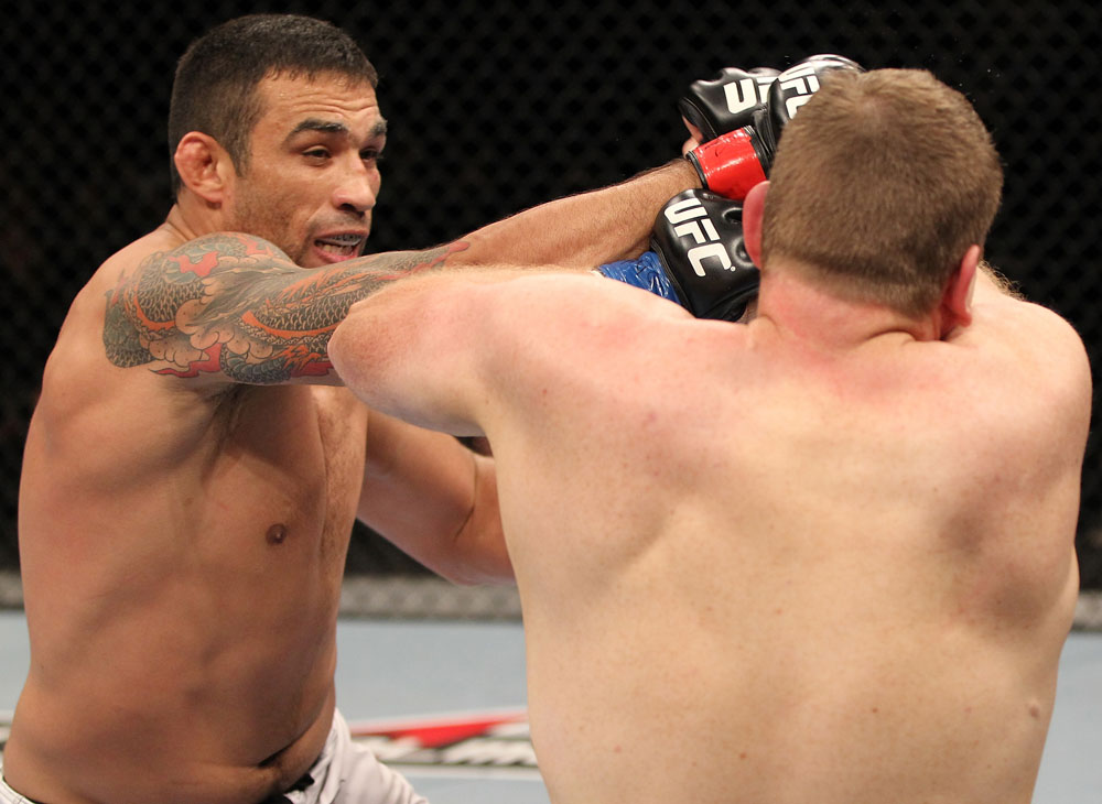 BELO HORIZONTE, BRAZIL - JUNE 23: (L-R) Fabricio Werdum punches Mike Russow during their UFC 147 heavyweight bout at Estadio Jornalista Felipe Drummond on June 23, 2012 in Belo Horizonte, Brazil. (Photo by Josh Hedges/Zuffa LLC/Zuffa LLC via Getty Images)