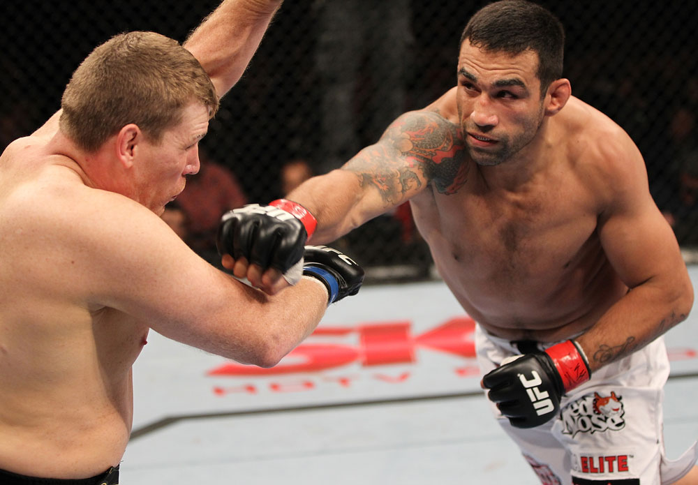 BELO HORIZONTE, BRAZIL - JUNE 23: (R-L) Fabricio Werdum punches Mike Russow during their UFC 147 heavyweight bout at Estadio Jornalista Felipe Drummond on June 23, 2012 in Belo Horizonte, Brazil. (Photo by Josh Hedges/Zuffa LLC/Zuffa LLC via Getty Images)