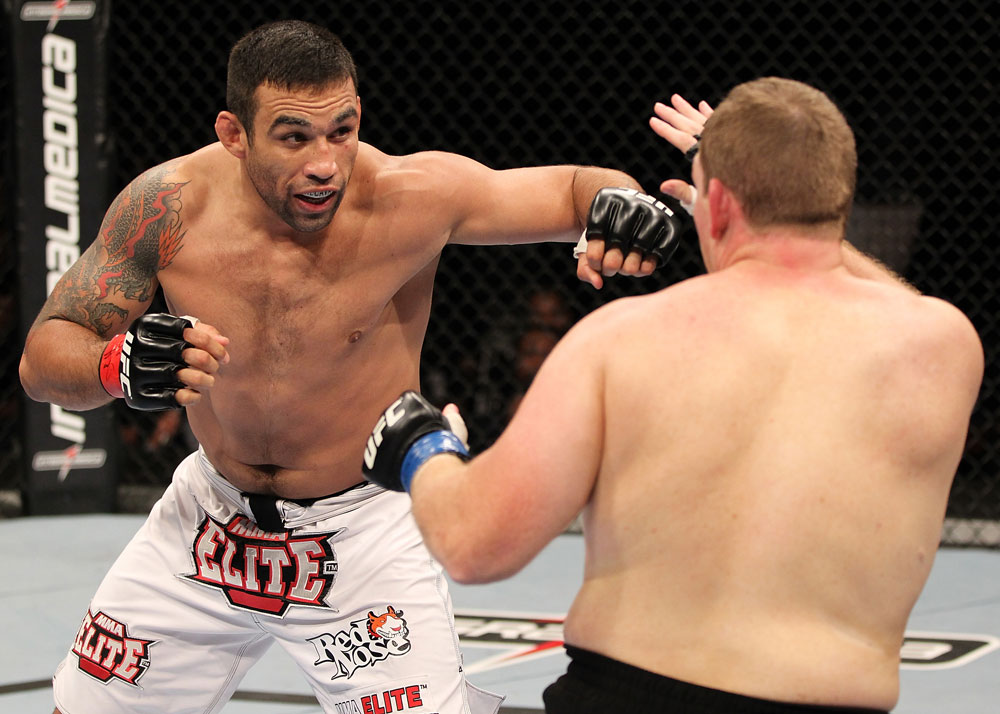 BELO HORIZONTE, BRAZIL - JUNE 23: (L-R) Fabricio Werdum punches Mike Russow during their UFC 147 heavyweight bout at Estadio Jornalista Felipe Drummond on June 23, 2012 in Belo Horizonte, Brazil. (Photo by Josh Hedges/Zuffa LLC/Zuffa LLC via Getty Images)