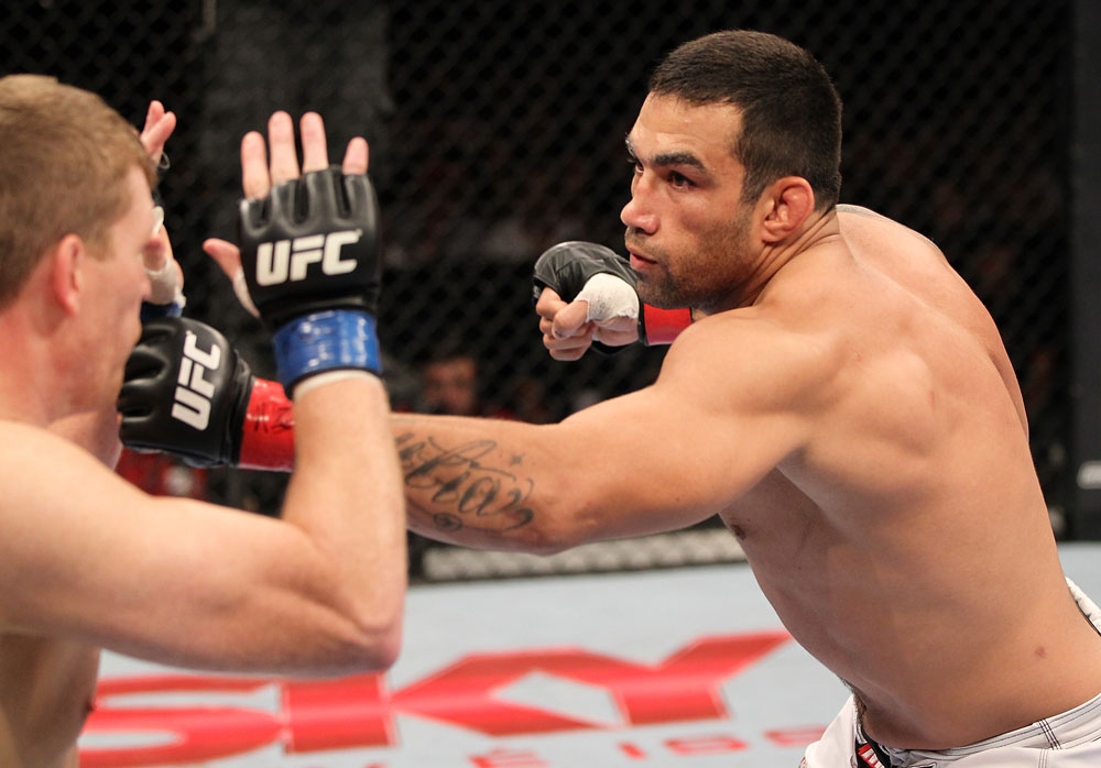 BELO HORIZONTE, BRAZIL - JUNE 23: (R-L) Fabricio Werdum punches Mike Russow during their UFC 147 heavyweight bout at Estadio Jornalista Felipe Drummond on June 23, 2012 in Belo Horizonte, Brazil. (Photo by Josh Hedges/Zuffa LLC/Zuffa LLC via Getty Images)