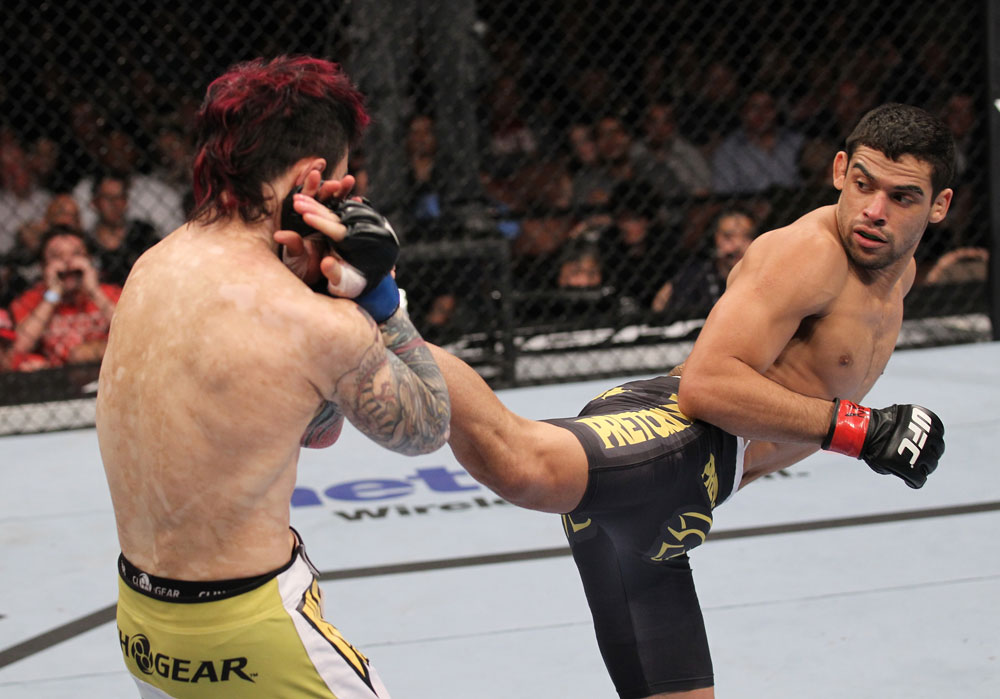 LAS VEGAS, NV - FEBRUARY 04:  Renan Barao (right) kicks Scott Jorgensen during the UFC 143 event at Mandalay Bay Events Center on February 4, 2012 in Las Vegas, Nevada.  (Photo by Nick Laham/Zuffa LLC/Zuffa LLC via Getty Images) *** Local Caption *** Renan Barao; Scott Jorgensen