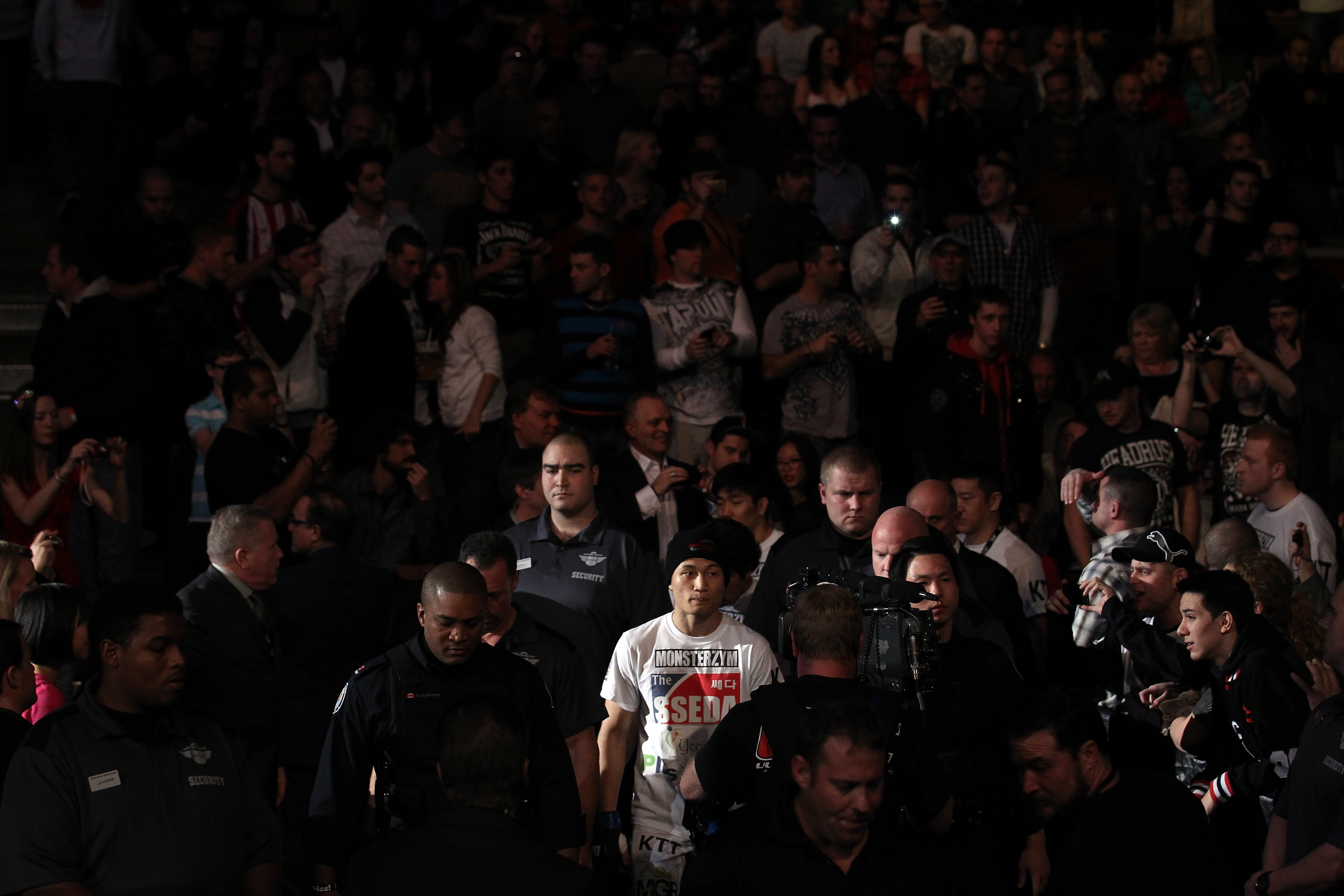 TORONTO, ON - DECEMBER 10:  "The Korean Zombie" Chan Sung Jung enters the arena before his bout against Mark Hominick during the UFC 140 event at Air Canada Centre on December 10, 2011 in Toronto, Ontario, Canada.  (Photo by Nick Laham/Zuffa LLC/Zuffa LLC via Getty Images)