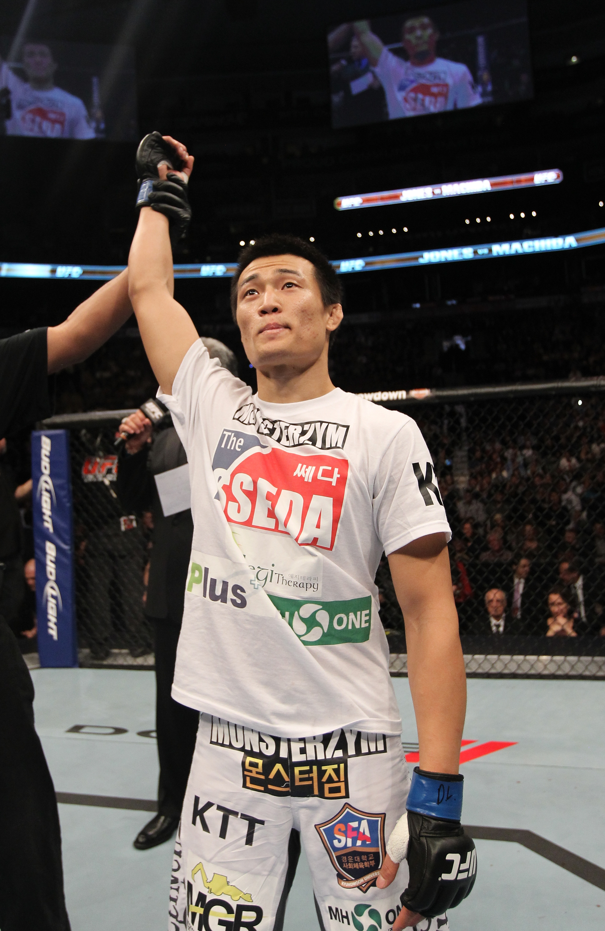 TORONTO, ON - DECEMBER 10:  "The Korean Zombie" Chan Sung Jung reacts after knocking out Mark Hominick during the UFC 140 event at Air Canada Centre on December 10, 2011 in Toronto, Ontario, Canada.  (Photo by Nick Laham/Zuffa LLC/Zuffa LLC via Getty Images)
