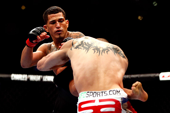 CHICAGO, IL - JANUARY 26:  Anthony Pettis (L) kicks Donald Cerrone (R) during their Lightweight Bout part of UFC on FOX at United Center on January 26, 2013 in Chicago, Illinois.  (Photo by Josh Hedges/Zuffa LLC/Zuffa LLC Via Getty Images)