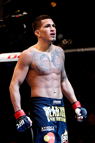 CHICAGO, IL - JANUARY 26:  Anthony Pettis celebrates defeating Donald Cerrone during their Lightweight Bout part of UFC on FOX at United Center on January 26, 2013 in Chicago, Illinois.  (Photo by Josh Hedges/Zuffa LLC/Zuffa LLC Via Getty Images)