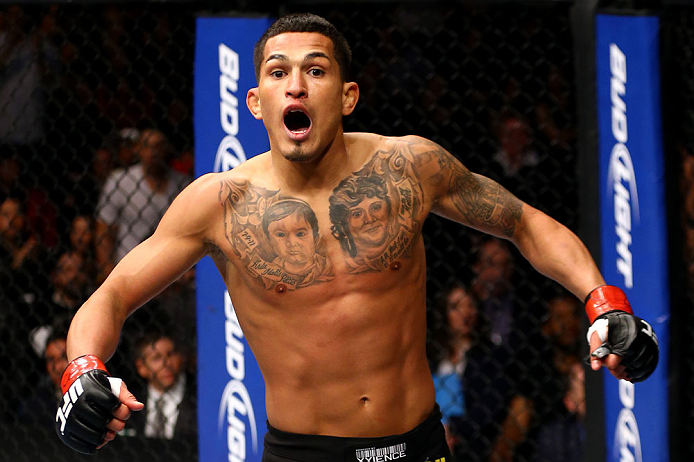 CHICAGO, IL - JANUARY 26:  Anthony Pettis celebrates defeating Donald Cerrone during their Lightweight Bout part of UFC on FOX at United Center on January 26, 2013 in Chicago, Illinois.  (Photo by Al Bello/Zuffa LLC/Zuffa LLC Via Getty Images)