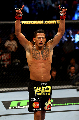 CHICAGO, IL - JANUARY 26:  Anthony Pettis celebrates defeating Donald Cerrone during their Lightweight Bout part of UFC on FOX at United Center on January 26, 2013 in Chicago, Illinois.  (Photo by Al Bello/Zuffa LLC/Zuffa LLC Via Getty Images)