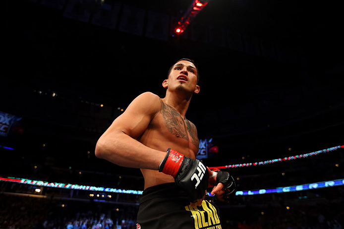 CHICAGO, IL - JANUARY 26:  Anthony Pettis celebrates defeating Donald Cerrone during their Lightweight Bout part of UFC on FOX at United Center on January 26, 2013 in Chicago, Illinois.  (Photo by Al Bello/Zuffa LLC/Zuffa LLC Via Getty Images)