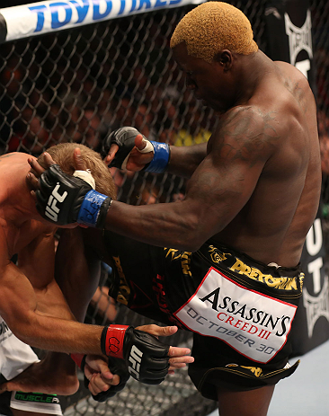 DENVER, CO - AUGUST 11: (R-L) Melvin Guillard delivers a knee strike against Donald "Cowboy" Cerrone during their lightweight bout at UFC 150 inside Pepsi Center on August 11, 2012 in Denver, Colorado. (Photo by Nick Laham/Zuffa LLC/Zuffa LLC via Getty Images)
