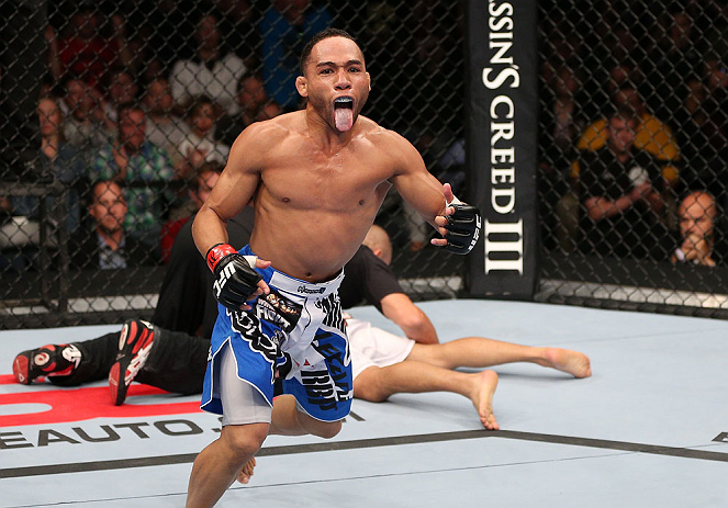MINNEAPOLIS, MN - OCTOBER 05: John Dodson reacts after knocking out Jussier Formiga during their flyweight fight at the UFC on FX event at Target Center on October 5, 2012 in Minneapolis, Minnesota. (Photo by Josh Hedges/Zuffa LLC/Zuffa LLC via Getty Images)
