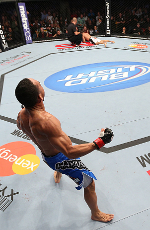 MINNEAPOLIS, MN - OCTOBER 05: John Dodson (L) reacts after knocking out Jussier Formiga during their flyweight fight at the UFC on FX event at Target Center on October 5, 2012 in Minneapolis, Minnesota. (Photo by Josh Hedges/Zuffa LLC/Zuffa LLC via Getty Images)