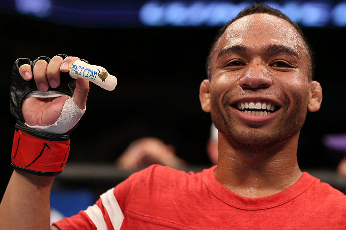 MINNEAPOLIS, MN - OCTOBER 05: John Dodson reacts after knocking out Jussier Formiga during their flyweight fight at the UFC on FX event at Target Center on October 5, 2012 in Minneapolis, Minnesota. (Photo by Josh Hedges/Zuffa LLC/Zuffa LLC via Getty Images)