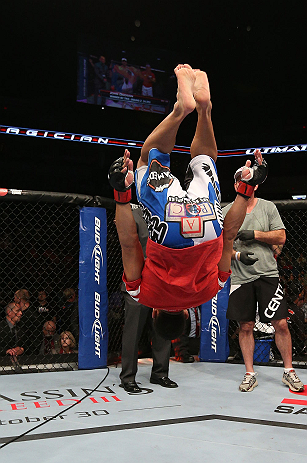 MINNEAPOLIS, MN - OCTOBER 05: John Dodson reacts after knocking out Jussier Formiga during their flyweight fight at the UFC on FX event at Target Center on October 5, 2012 in Minneapolis, Minnesota. (Photo by Josh Hedges/Zuffa LLC/Zuffa LLC via Getty Images)
