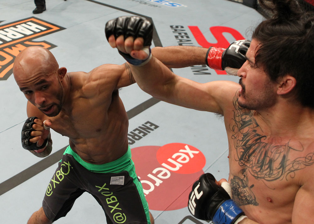 SYDNEY, AUSTRALIA - MARCH 03: (L-R) Demetrious Johnson and Ian McCall trade punches in a flyweight bout during the UFC on FX event at Allphones Arena on March 3, 2012 in Sydney, Australia. (Photo by Josh Hedges/Zuffa LLC/Zuffa LLC via Getty Images) *** Local Caption *** Demetrious Johnson; Ian McCall