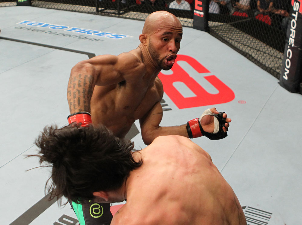 SYDNEY, AUSTRALIA - MARCH 03: (R-L) Demetrious Johnson punches Ian McCall in a flyweight bout during the UFC on FX event at Allphones Arena on March 3, 2012 in Sydney, Australia. (Photo by Josh Hedges/Zuffa LLC/Zuffa LLC via Getty Images) *** Local Caption *** Demetrious Johnson; Ian McCall