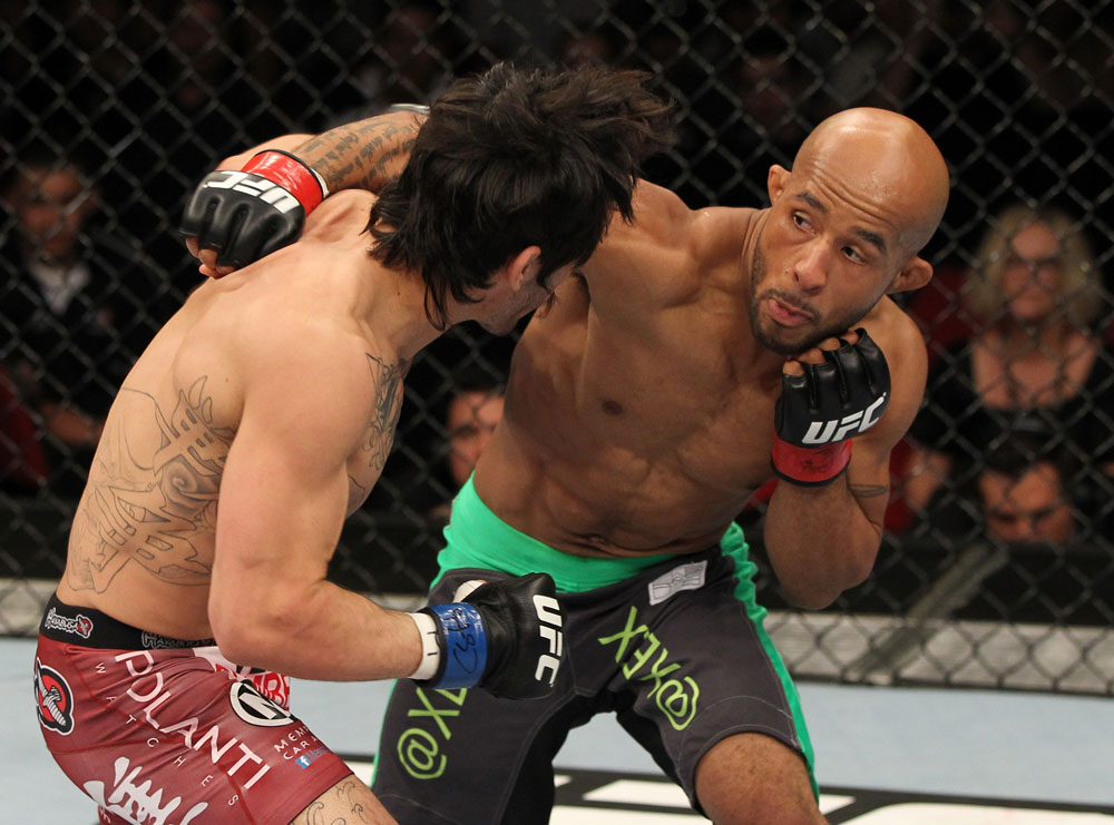 SYDNEY, AUSTRALIA - MARCH 03: (R-L) Demetrious Johnson punches Ian McCall in a flyweight bout during the UFC on FX event at Allphones Arena on March 3, 2012 in Sydney, Australia. (Photo by Josh Hedges/Zuffa LLC/Zuffa LLC via Getty Images) *** Local Caption *** Demetrious Johnson; Ian McCall