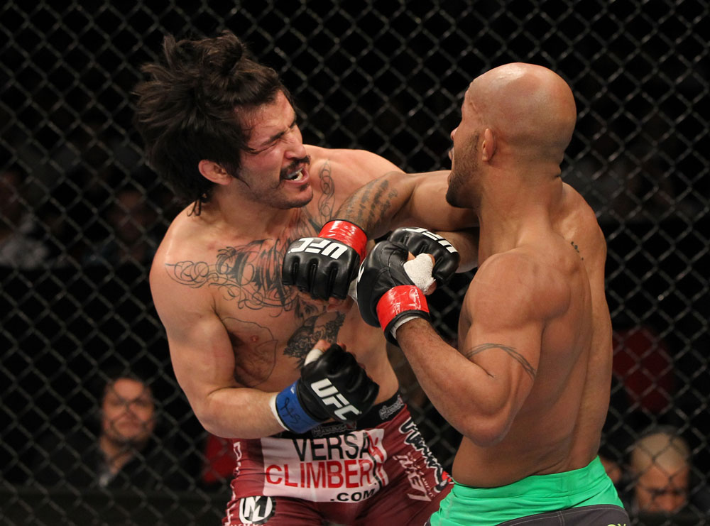 SYDNEY, AUSTRALIA - MARCH 03: (R-L) Demetrious Johnson punches Ian McCall in a flyweight bout during the UFC on FX event at Allphones Arena on March 3, 2012 in Sydney, Australia. (Photo by Josh Hedges/Zuffa LLC/Zuffa LLC via Getty Images) *** Local Caption *** Demetrious Johnson; Ian McCall