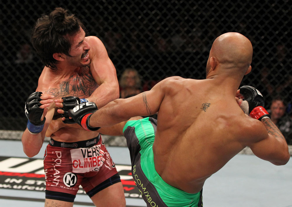 SYDNEY, AUSTRALIA - MARCH 03: (R-L) Demetrious Johnson kicks Ian McCall in a flyweight bout during the UFC on FX event at Allphones Arena on March 3, 2012 in Sydney, Australia. (Photo by Josh Hedges/Zuffa LLC/Zuffa LLC via Getty Images) *** Local Caption *** Demetrious Johnson; Ian McCall