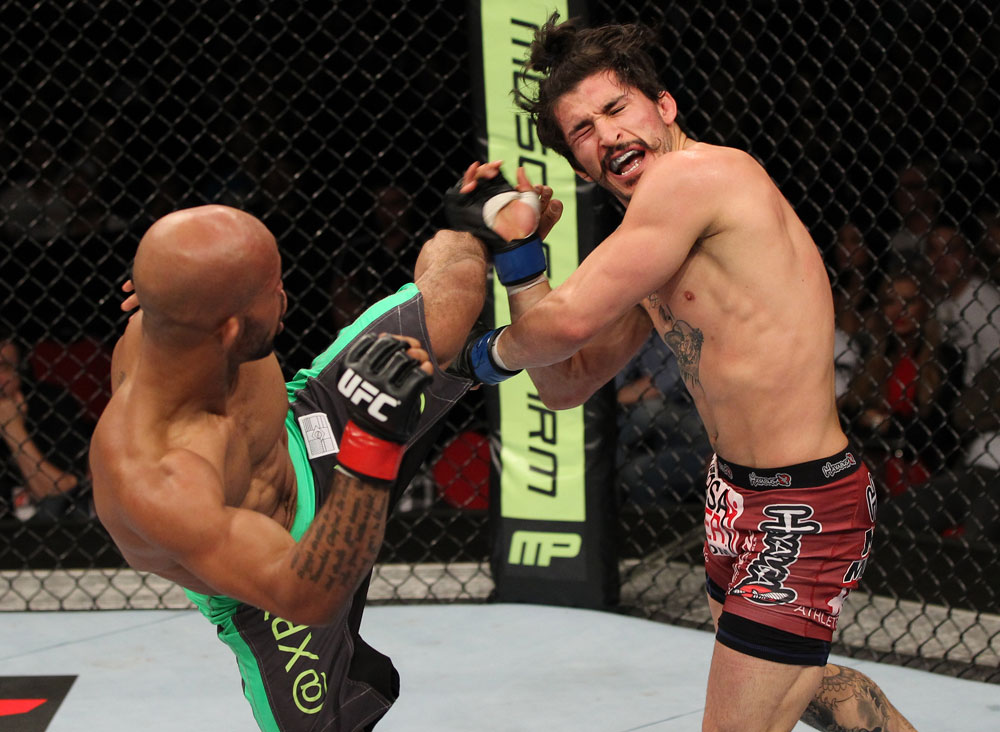SYDNEY, AUSTRALIA - MARCH 03: (L-R) Demetrious Johnson kicks Ian McCall in a flyweight bout during the UFC on FX event at Allphones Arena on March 3, 2012 in Sydney, Australia. (Photo by Josh Hedges/Zuffa LLC/Zuffa LLC via Getty Images) *** Local Caption *** Demetrious Johnson; Ian McCall