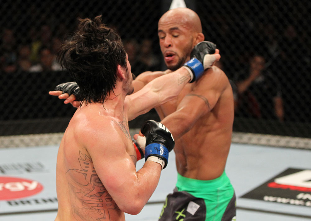 SYDNEY, AUSTRALIA - MARCH 03: (L-R) Ian McCall punches Demetrious Johnson in a flyweight bout during the UFC on FX event at Allphones Arena on March 3, 2012 in Sydney, Australia. (Photo by Josh Hedges/Zuffa LLC/Zuffa LLC via Getty Images) *** Local Caption *** Demetrious Johnson; Ian McCall