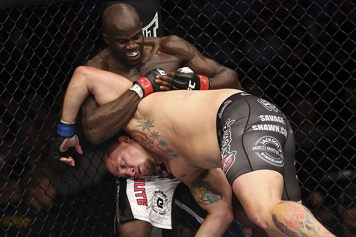 CALGARY, CANADA - JULY 21: (L-R) Cheick Kongo grabs the left arm of Shawn Jordan during their heavyweight bout at UFC 149 inside the Scotiabank Saddledome on July 21, 2012 in Calgary, Alberta, Canada.  (Photo by Nick Laham/Zuffa LLC/Zuffa LLC via Getty Images)