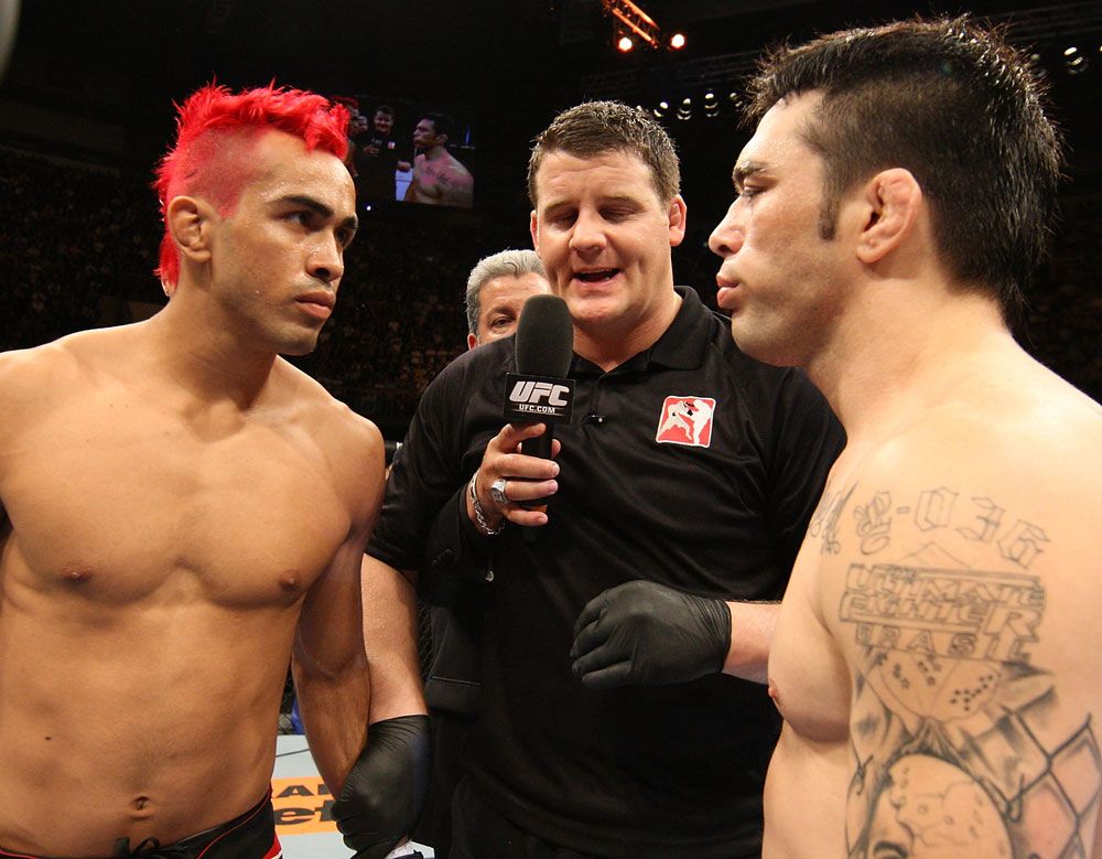 BELO HORIZONTE, BRAZIL - JUNE 23: (L-R) Opponents Godofredo Pepey and Rony "Jason" Mariano Bezerra receive final instructions from the referee before their UFC 147 featherweight bout at Estadio Jornalista Felipe Drummond on June 23, 2012 in Belo Horizonte, Brazil. (Photo by Josh Hedges/Zuffa LLC/Zuffa LLC via Getty Images)