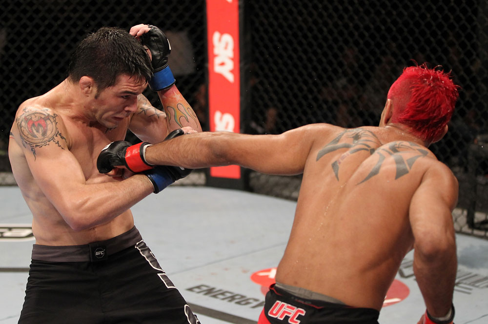 BELO HORIZONTE, BRAZIL - JUNE 23: (R-L) Godofredo Pepey punches Rony "Jason" Mariano Bezerra during their UFC 147 featherweight bout at Estadio Jornalista Felipe Drummond on June 23, 2012 in Belo Horizonte, Brazil. (Photo by Josh Hedges/Zuffa LLC/Zuffa LLC via Getty Images)