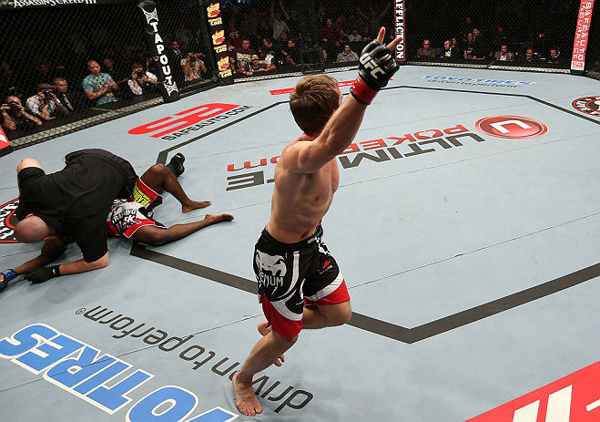 NOTTINGHAM, ENGLAND - SEPTEMBER 29: Brad Pickett (R) reacts after knocking out Yves Jabouin during their bantamweight fight at the UFC on Fuel TV event at Capital FM Arena on September 29, 2012 in Nottingham, England. (Photo by Josh Hedges/Zuffa LLC/Zuffa LLC via Getty Images)