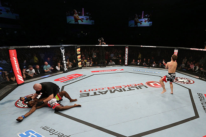 NOTTINGHAM, ENGLAND - SEPTEMBER 29: Brad Pickett (R) reacts after knocking out Yves Jabouin during their bantamweight fight at the UFC on Fuel TV event at Capital FM Arena on September 29, 2012 in Nottingham, England. (Photo by Josh Hedges/Zuffa LLC/Zuffa LLC via Getty Images)